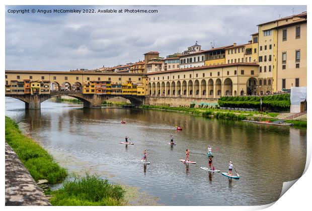 Paddle boarders on the Arno in Florence, Tuscany Print by Angus McComiskey