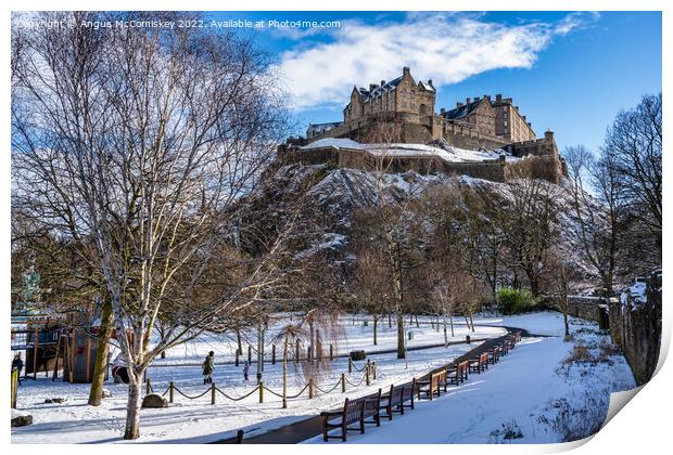 Edinburgh Castle snow from Princes Street Gardens Print by Angus McComiskey