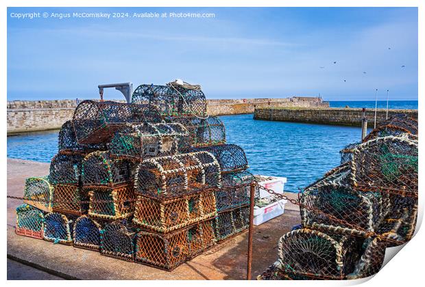 Lobster pots on quayside at St Andrews harbour Print by Angus McComiskey
