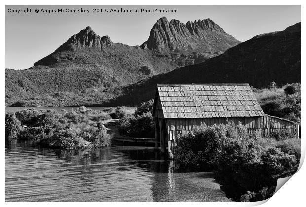 Boat shed with backdrop of Cradle Mountain (mono) Print by Angus McComiskey