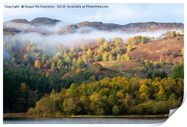 Mist shrouded autumn colours on Loch Faskally Print by Angus McComiskey
