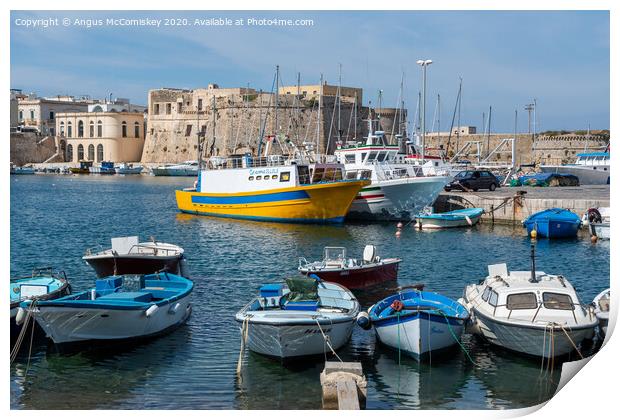Boats tied up in Gallipoli harbour in Puglia Print by Angus McComiskey