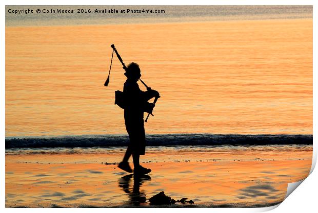 Piper on the beach at Arisaig, Scotland Print by Colin Woods