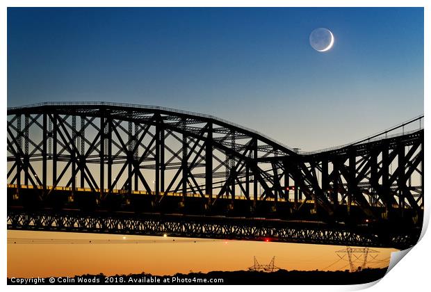 A new moon with earthshine with the Pont du Quebec Print by Colin Woods
