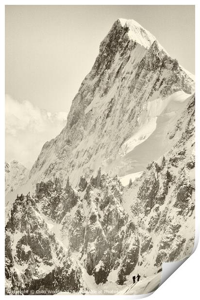 The tiny figure of a climber in front  of the Grandes Jorasses Print by Colin Woods