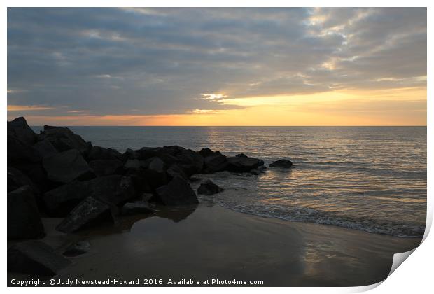 Sunset at Brancaster beach, Norfolk Print by Judy Newstead-Howard