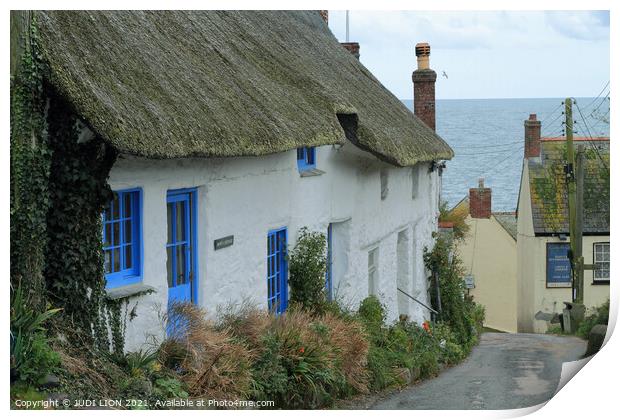 Thatched cottages by the sea Print by JUDI LION