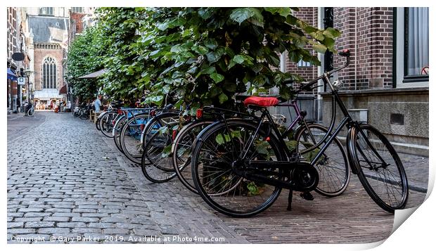 Multiple bicycles parks on a Dutch street Print by Gary Parker