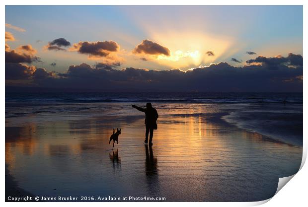 Walking the Dog at Sunset on Dunraven Bay Beach Print by James Brunker