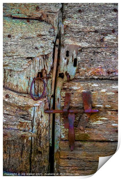 Detail of an old barn door showing the bolt and handle in a closed position Print by Joy Walker