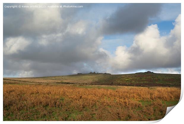 Rain clouds forming over Staple tors in Devon Print by Kevin White