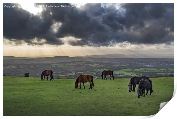 Evening storm clouds gathering over Tavistock and the Dartmoor h Print by Kevin White