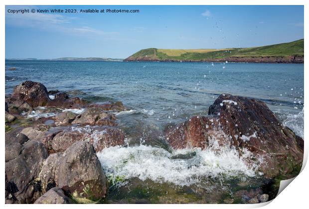 Sea waves crashing against the rocks on Manorbier Beach pembroke Print by Kevin White