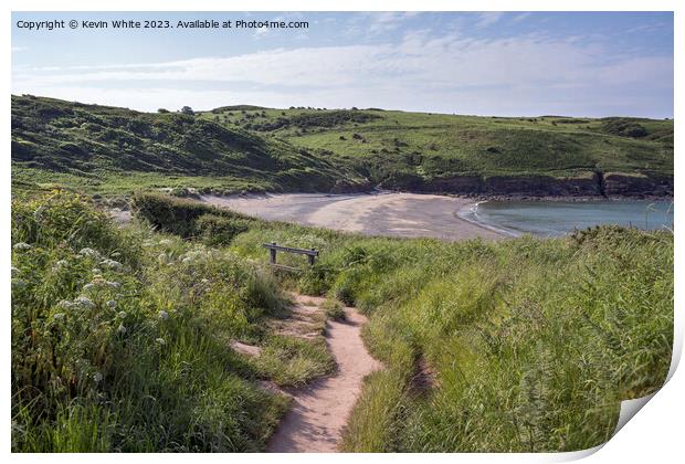 Cliff walk down to Manorbier Beach in South Wales Print by Kevin White