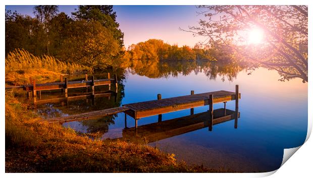 Wooden Jetties on a Becalmed Lake at Sunset Print by Alan Hill