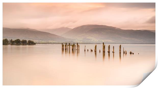 Loch Lomond jetty and mountains at sunset Print by Alan Hill