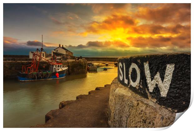 Fishing boats hunker down in Lyme Regis harbour Print by Alan Hill