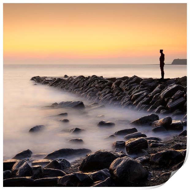 Lone figure stands looking out to sea Print by Alan Hill