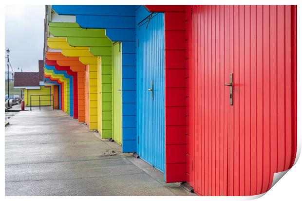Colourful beach huts (de-focused near and far)  in a row on Scarborough North Bay Beach, Yorkshire, England Print by Dave Collins