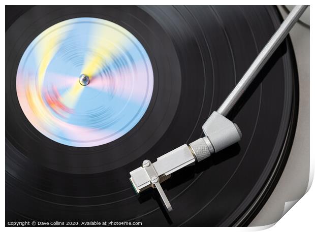 Vinyl Record Playing on a Record Player Print by Dave Collins