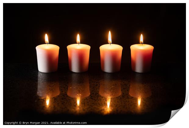 Four burning candles with reflections Print by Bryn Morgan