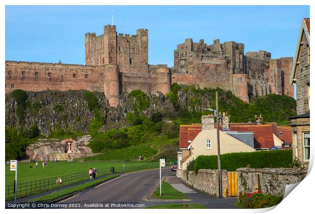 Bamburgh Castle in Bamburgh, Northumberland, UK Print by Chris Dorney