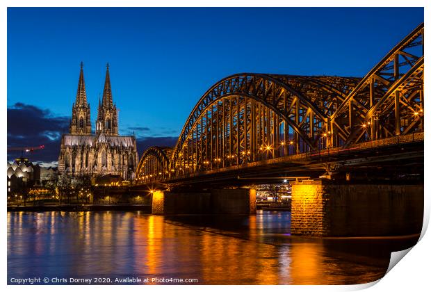 Cologne Cathedral and the Hohenzollern Bridge Print by Chris Dorney
