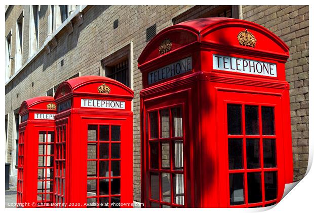 Red Telephone Boxes in London Print by Chris Dorney