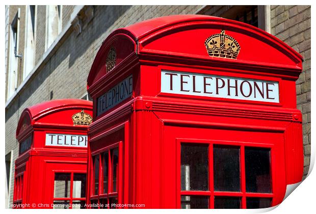 Red Telephone Boxes in London Print by Chris Dorney