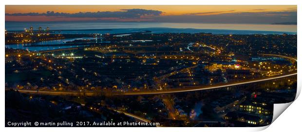 the sun goes down over Port Talbot Print by martin pulling