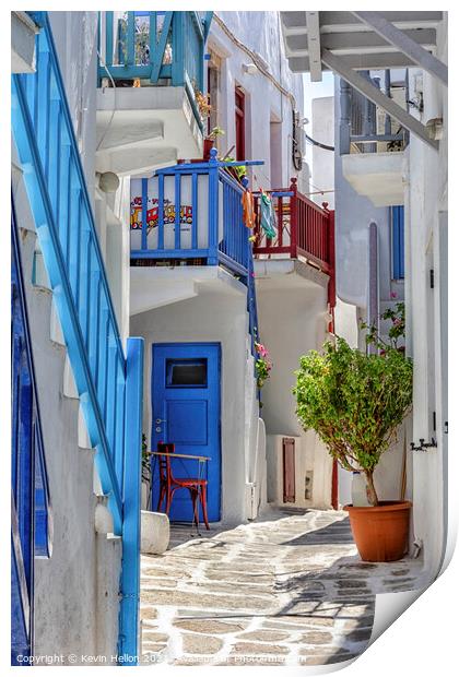 Typical street on the island of Mykonos, Greece Print by Kevin Hellon