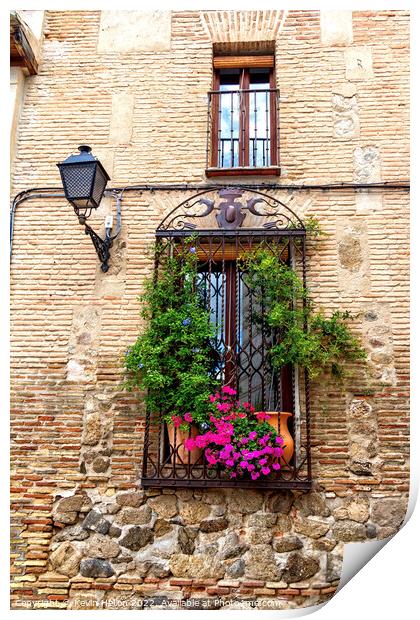 Window with flowers in old house in Toledo, Spain Print by Kevin Hellon