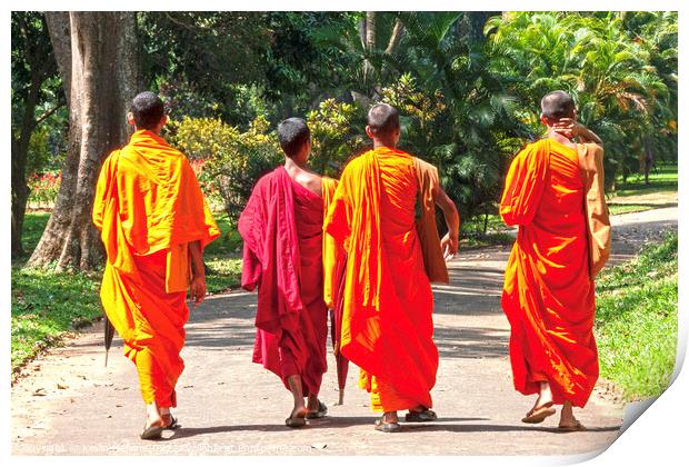 Monks in orange and maroon robes Print by Kevin Hellon