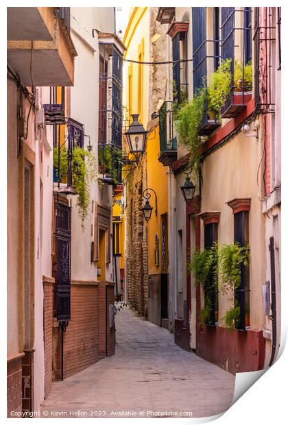 Narrow street in Seville, Spain Print by Kevin Hellon