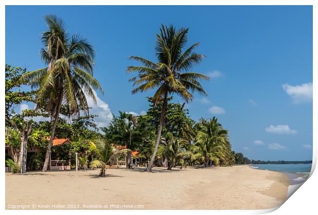 Resort on tropical beach with palm trees in Chumph Print by Kevin Hellon