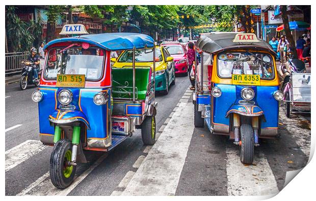 Tuk tuks on a street in the city. Print by Kevin Hellon
