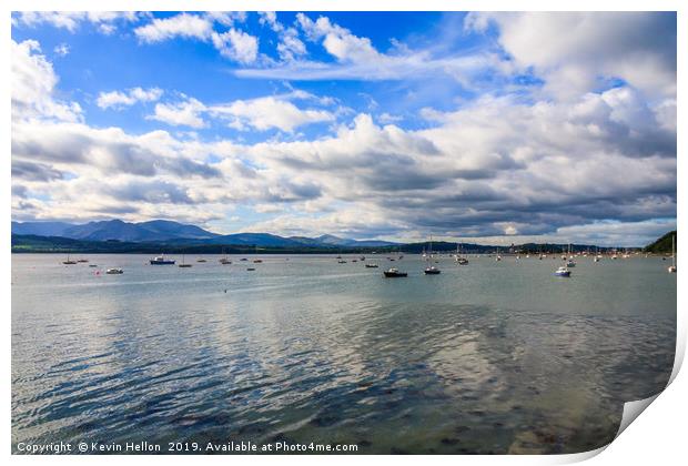 Blue sky and clouds over boats moored in the Menai Print by Kevin Hellon