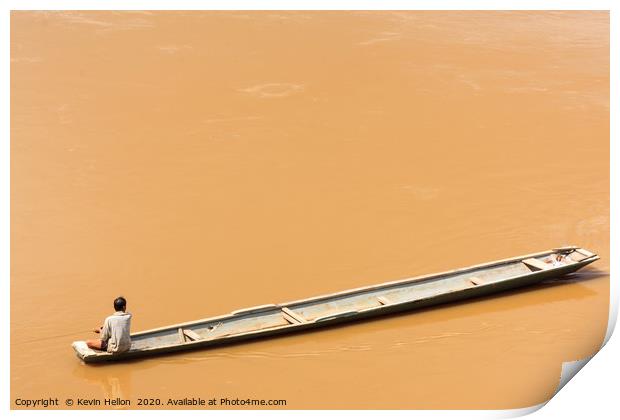 Man in boat on the Mekhong River  Print by Kevin Hellon
