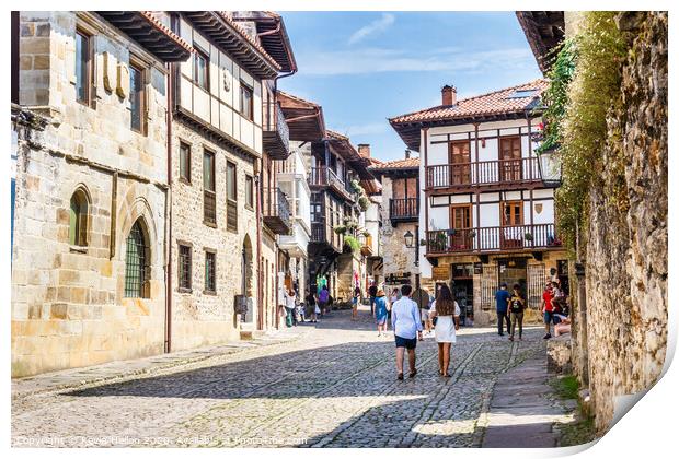 Tourists walking around the town in Santillana, Sp Print by Kevin Hellon