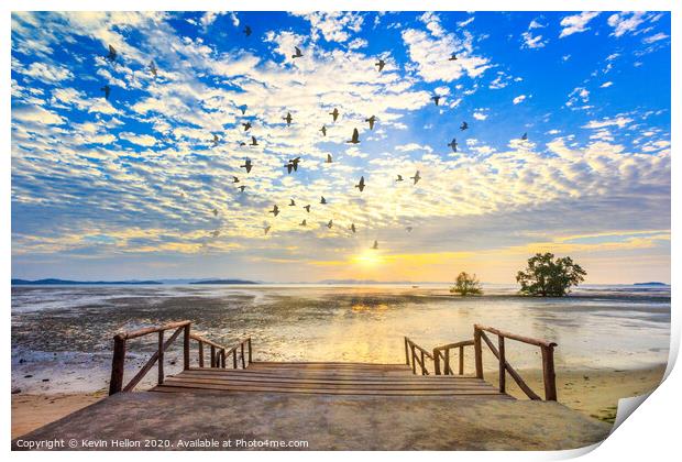 Sunrise with sunrays and flock of birds Print by Kevin Hellon