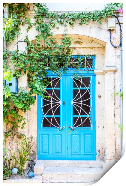 Blue door on house Print by Kevin Hellon