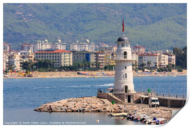The lighthouse guarding the entrance to Alanya harbour Print by Kevin Hellon