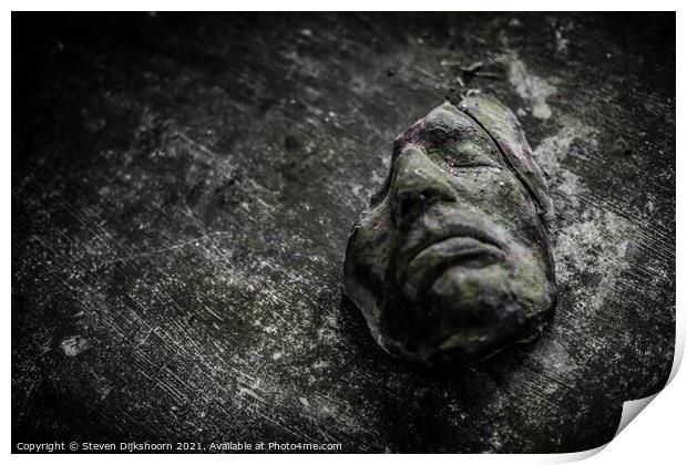 A broken mask on a table Print by Steven Dijkshoorn