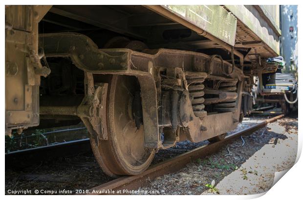 old rosted dirty wheels from train on railroad Print by Chris Willemsen