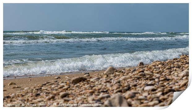 ocean waves and rocks on the beach Print by Chris Willemsen