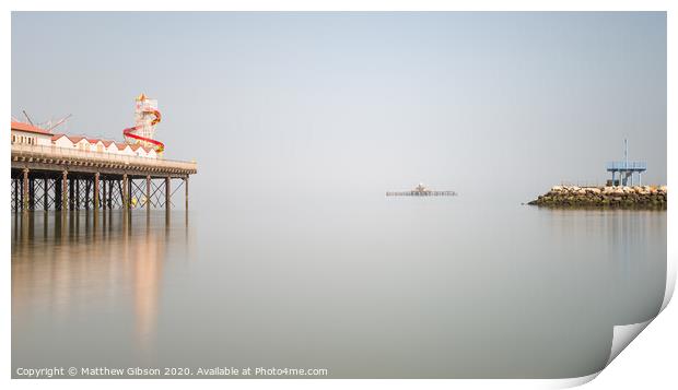 Minimalist fine art landscape image of colorful pier in juxtaposition with old derelict pier in background Print by Matthew Gibson