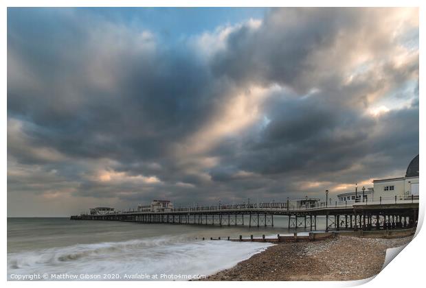 Beautiful long exposure sunset landscape image of pier at sea in Worthing England Print by Matthew Gibson