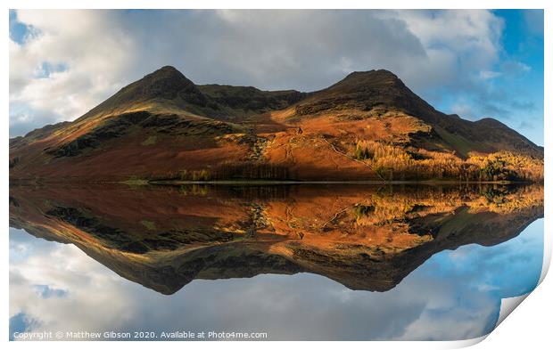 Majestic vibrant Autumn Fall landscape Buttermere in Lake District with beautiful early morning sunlight playing across the hills and mountains Print by Matthew Gibson