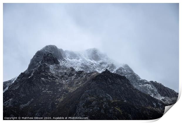 Stunning moody dramatic Winter landscape image of snowcapped Y Garn mountain in Snowdonia Print by Matthew Gibson