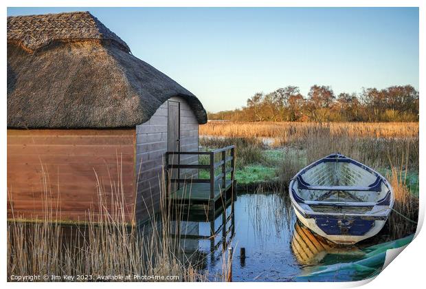 Thatched boat houses Hickling Broad Print by Jim Key